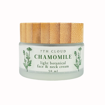 A frosted glass jar with a bamboo lid labeled '7th Cloud Chamomile Light Botanical Face & Neck Cream 50ml'.