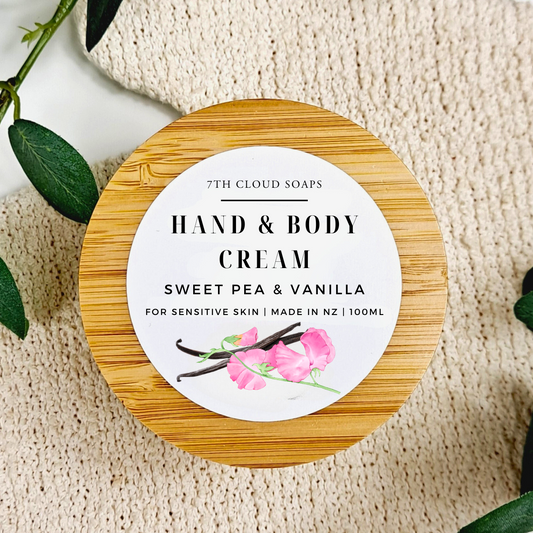 Hand and body cream container with wooden lid on a textured surface